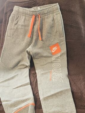 Nike Kids Gray Joggers with Bright Orange Accents